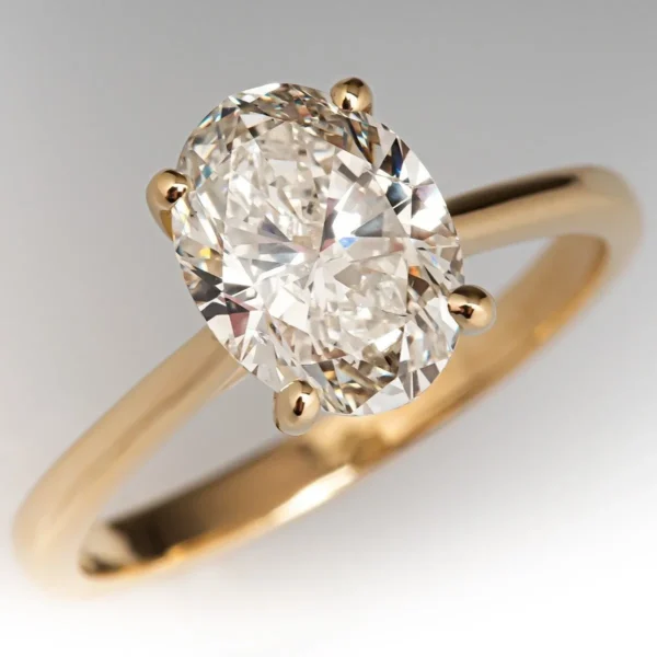 Oval Cut Diamond Engagement Ring in Gold